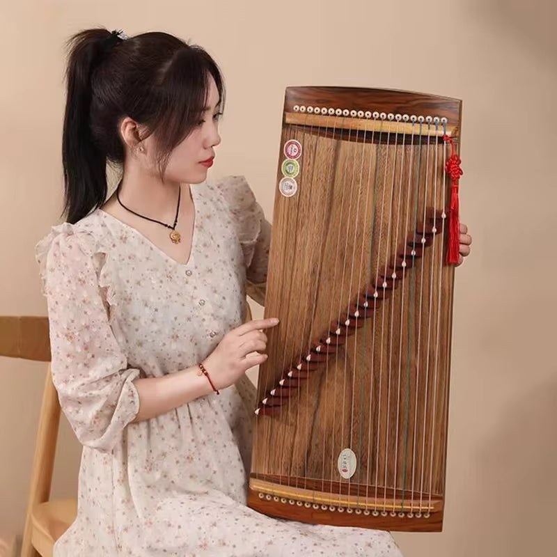 Traditional Asian Guzheng with 21 strings on a wooden body, 70 cm portable design