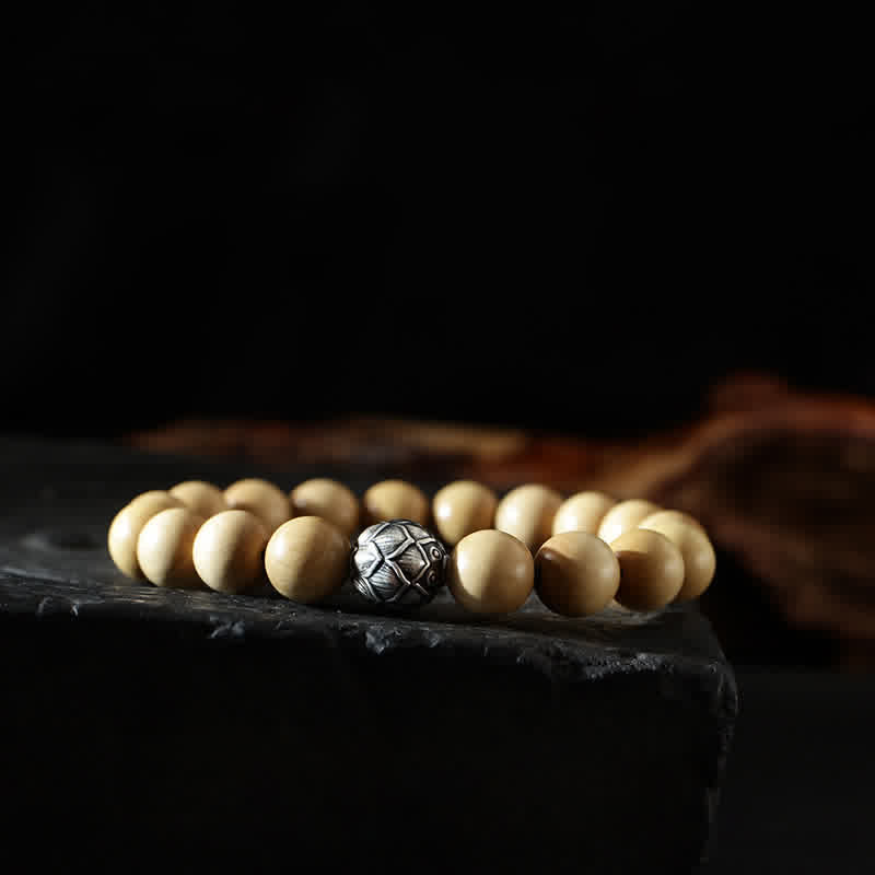 Cinnabar Bracelet with Peach Wood and Lotus Symbols