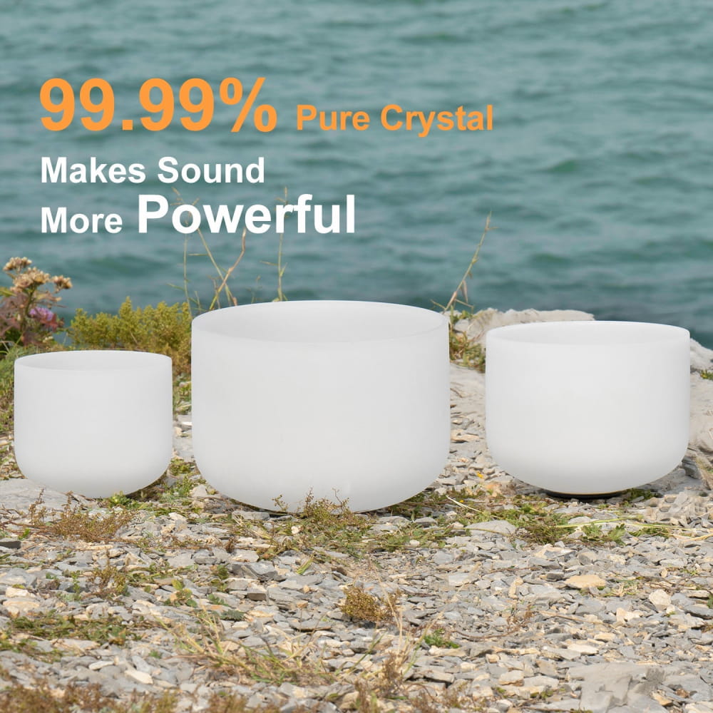 Three white Quartz Crystal Singing Bowls in a row for sound healing