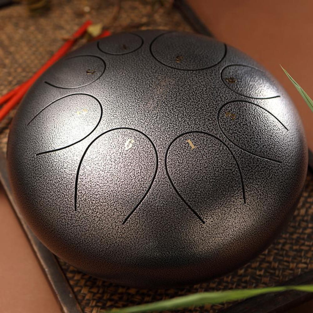 Steel tongue drum with petal-shaped tone zones in 8-Tone D Key design, 12 inch