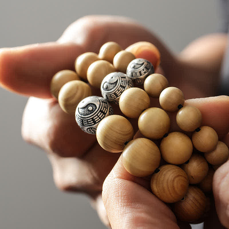 Cinnabar Bracelet with Peach Wood and Lotus Symbols