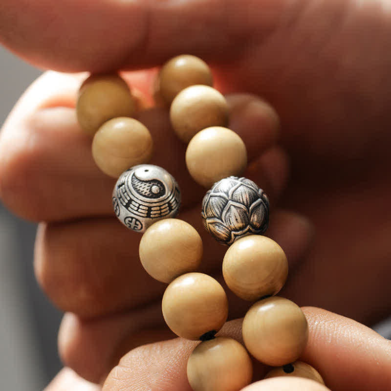 Cinnabar Bracelet with Peach Wood and Lotus Symbols