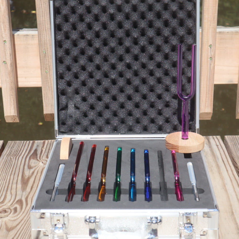 Metal case with colorful fountain pens and foam padding for 8pc Crystal Tuning Fork Set