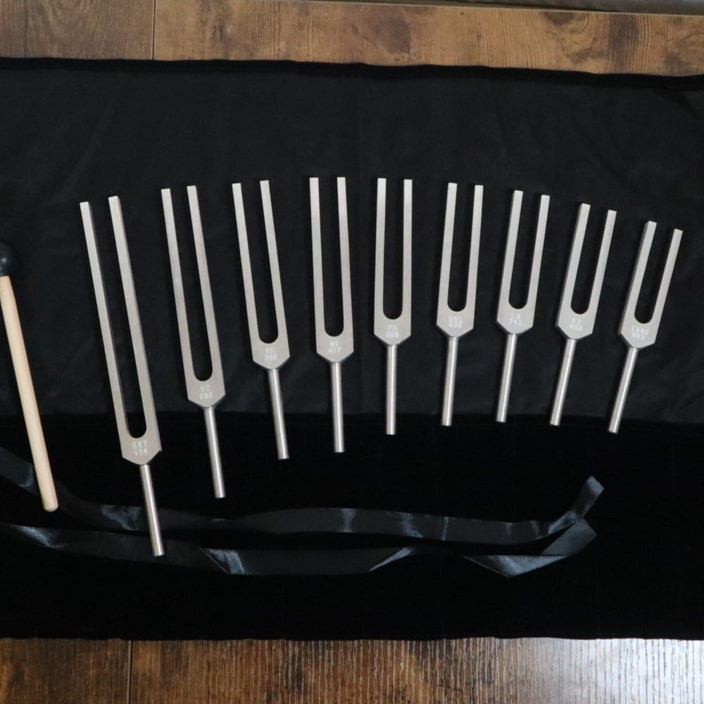 9pc Solfeggio Frequencies Set featuring a row of tuning forks for sound vibration