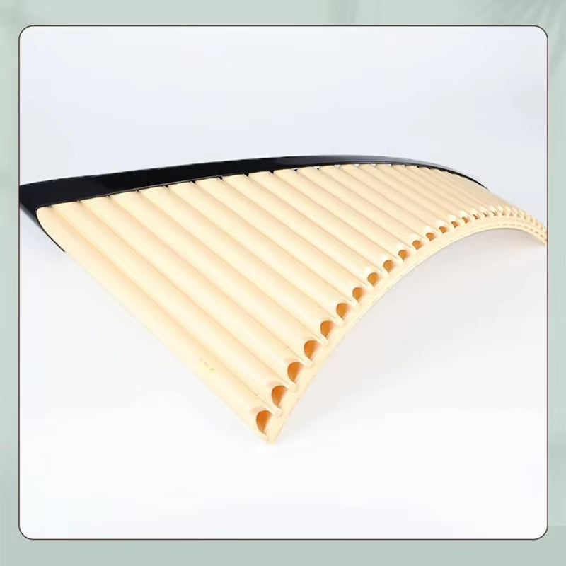 ABS Pan Flute for Students featuring curved bamboo pipes in a vibrant design