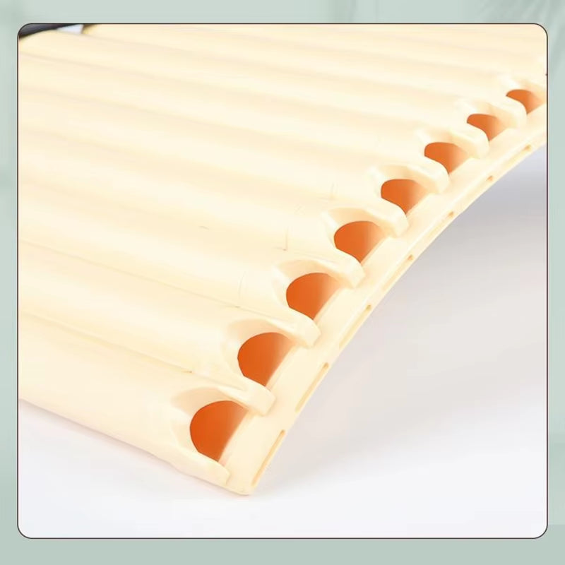 Memory foam mattress pad with egg crate texture beside ABS Pan Flute for Students