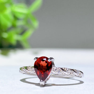 Adjustable Sterling Silver Garnet Ring with Opal Accent