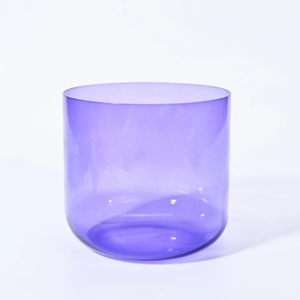 Purple translucent glass bowl with cylindrical sides from Alchemy Clear Purple B Note Crystal Singing Bowl