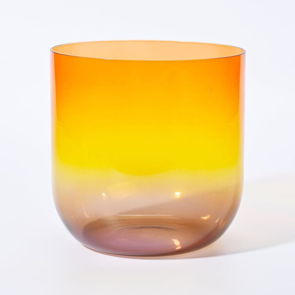 Gradient-colored glass vessel in orange, yellow, and brown for Alchemy Clear Rainbow D Note Crystal Singing Bowl