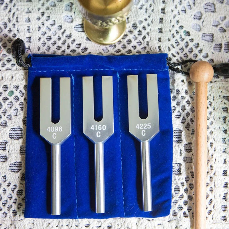 Set of three metal Angel Tuning Forks in a blue fabric case for healing therapy