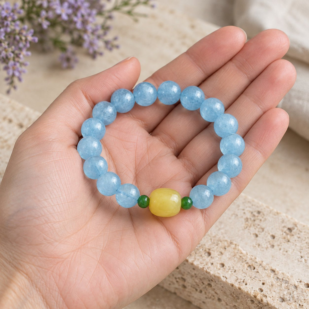 Natural Aquamarine Amber Serenity Healing Bracelet 8mm, held in the hand to show its real size