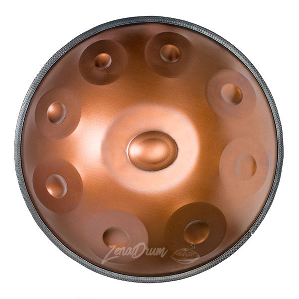 Copper-colored B2 Amara Handpan Drum with dimpled tone fields, ideal for beginners