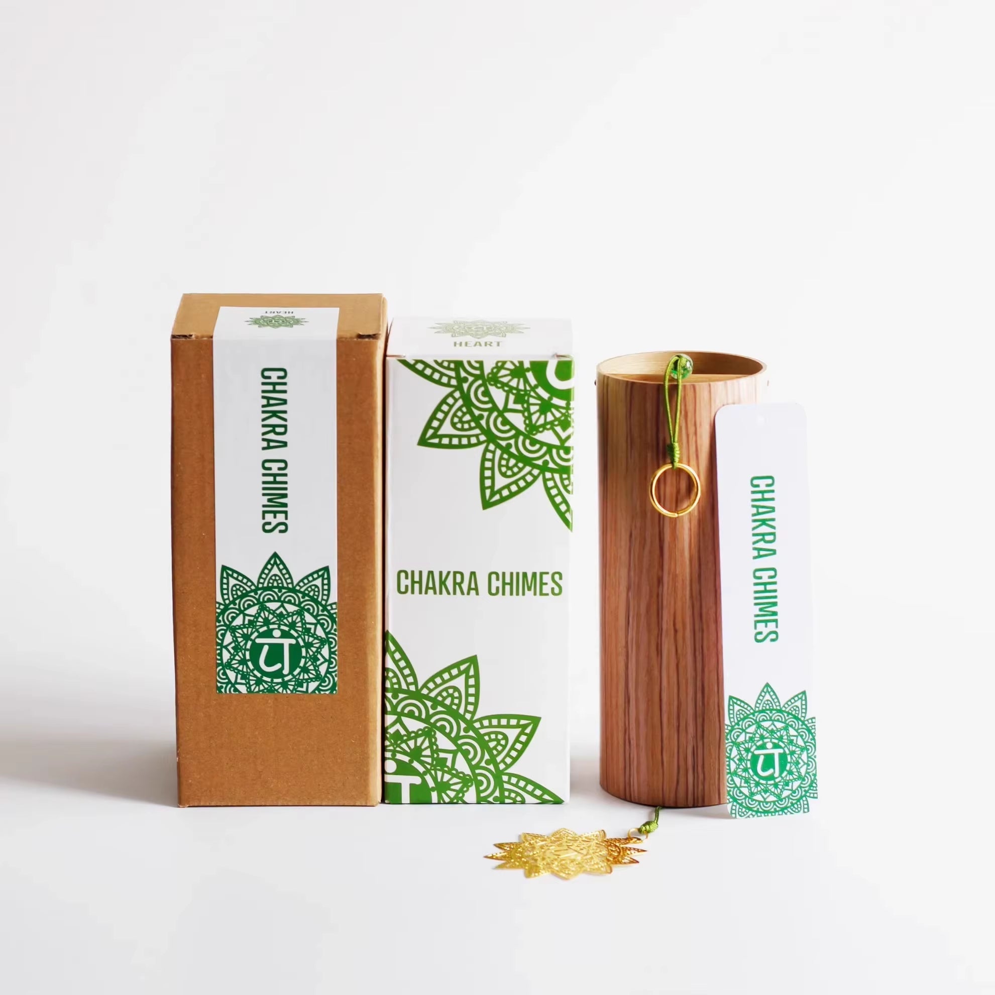 Wooden Chakra chimes in decorative green packaging with mandala designs