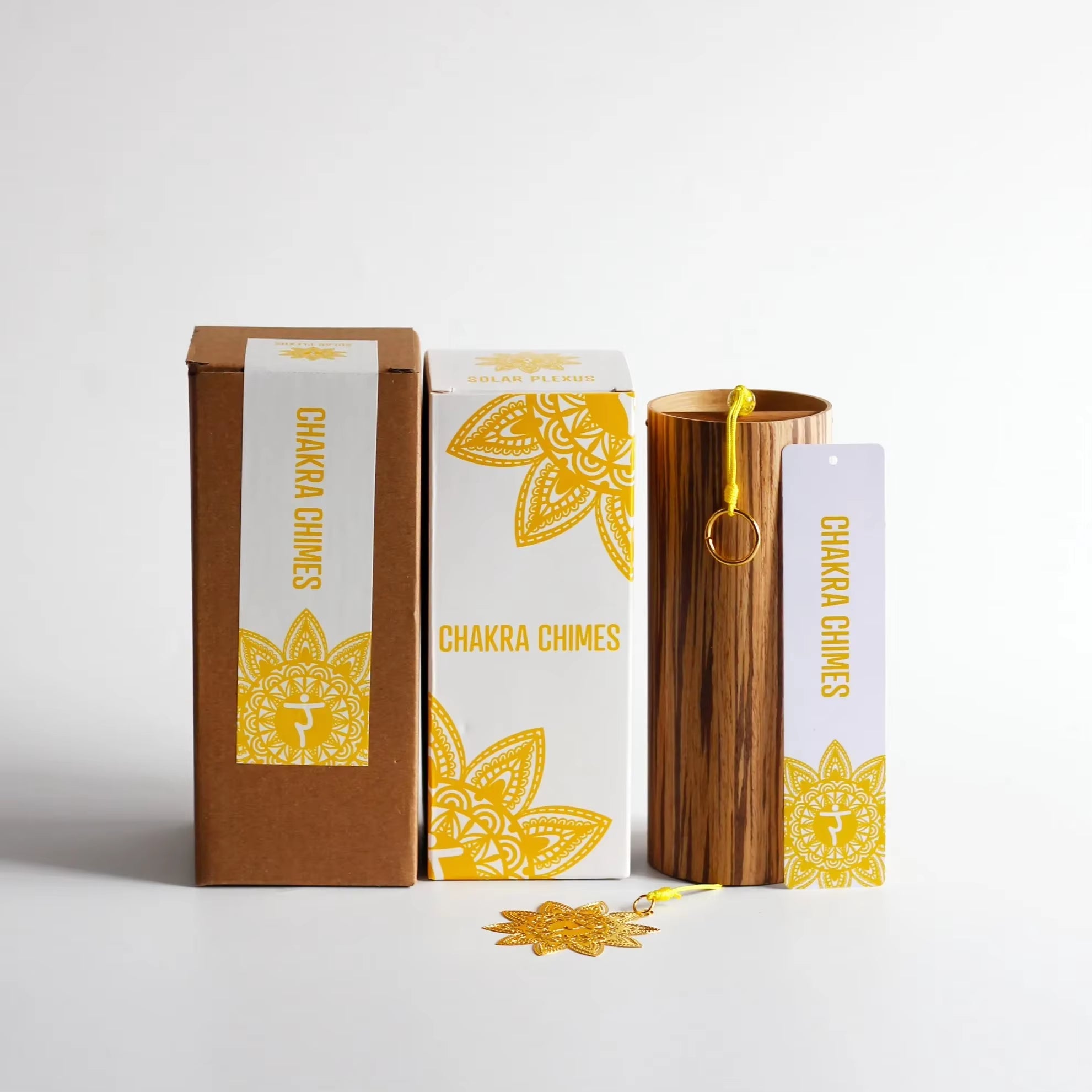 Chakra Chimes incense packaging with yellow mandala and wooden holder for Bamboo Koshi set