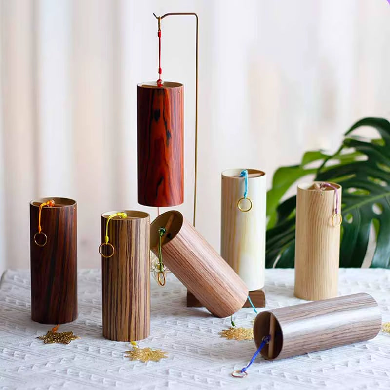 Wooden cylindrical tubes with decorative charms in Bamboo Koshi Wind Chimes set