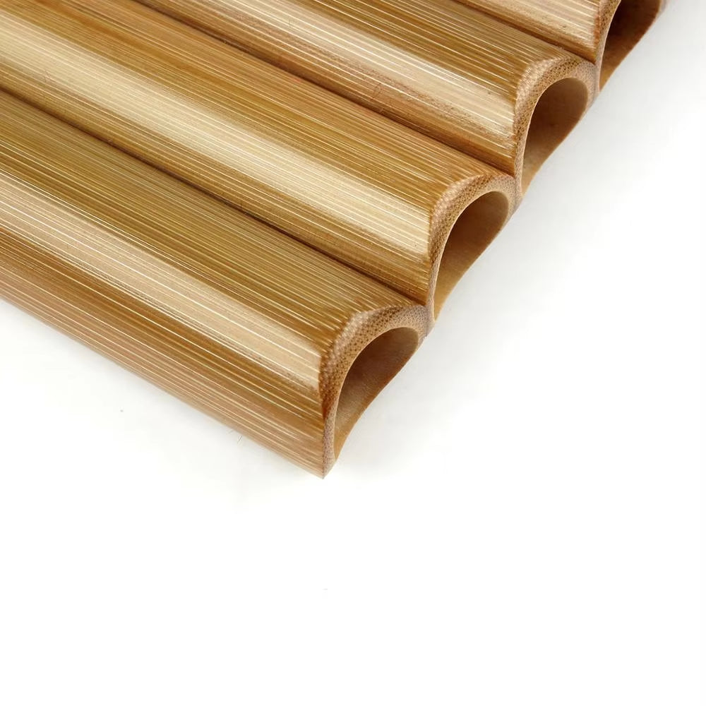 Parallel bamboo tubes diagonally arranged, highlighting hollow cross-sections of a pan flute