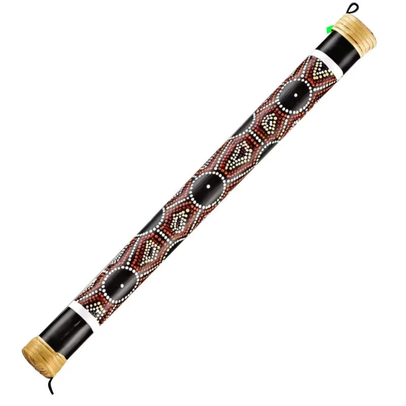 Decorative didgeridoo featuring Aboriginal dot painting in red, black, and white