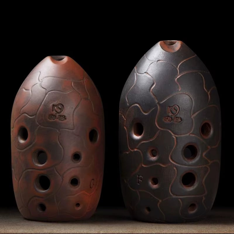 Two clay ocarinas with etched patterns for the Beginner Xun Instrument Dual-Chamber Ocarina