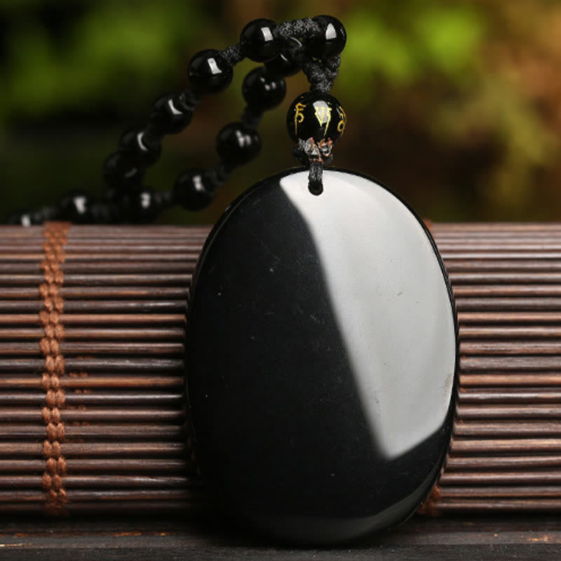 Black Obsidian Koi Fish Pendant Necklace for Strength & Fulfilment