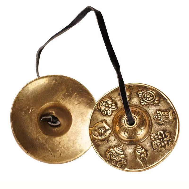 Brass Tingsha Buddha Hand Cymbals with black fabric strap for meditation practice