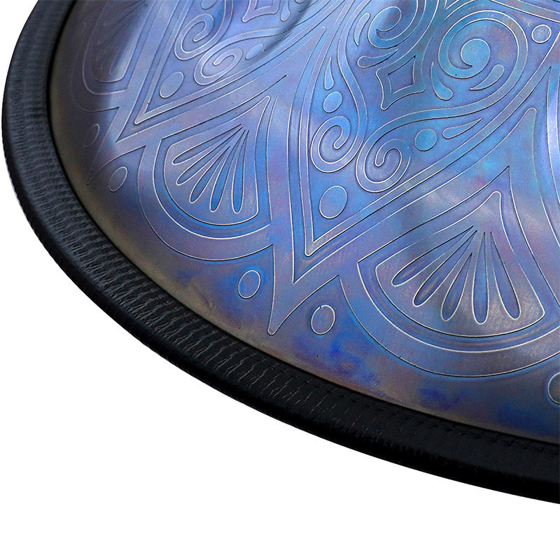 Steel tongue drum in iridescent blue with swirling patterns for beginners