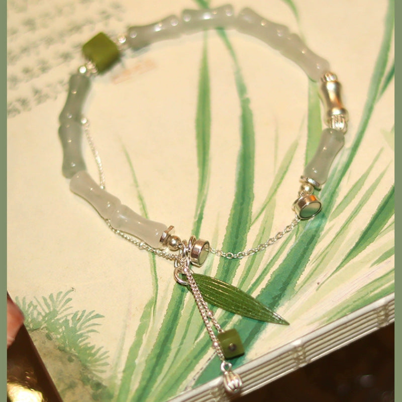 White Jade Happiness Bracelet with Bamboo Leaf Lantern Charm
