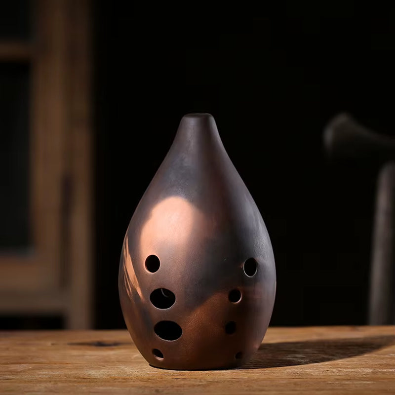 Teardrop-shaped ceramic vase with circular holes for Ceramic Xun Chinese musical instrument