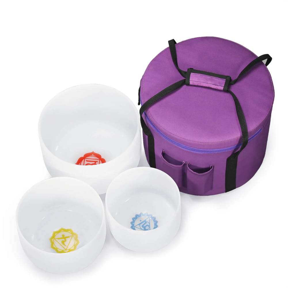 Purple carrying case with three white Crystal Singing Bowls from Chakra Symbol set