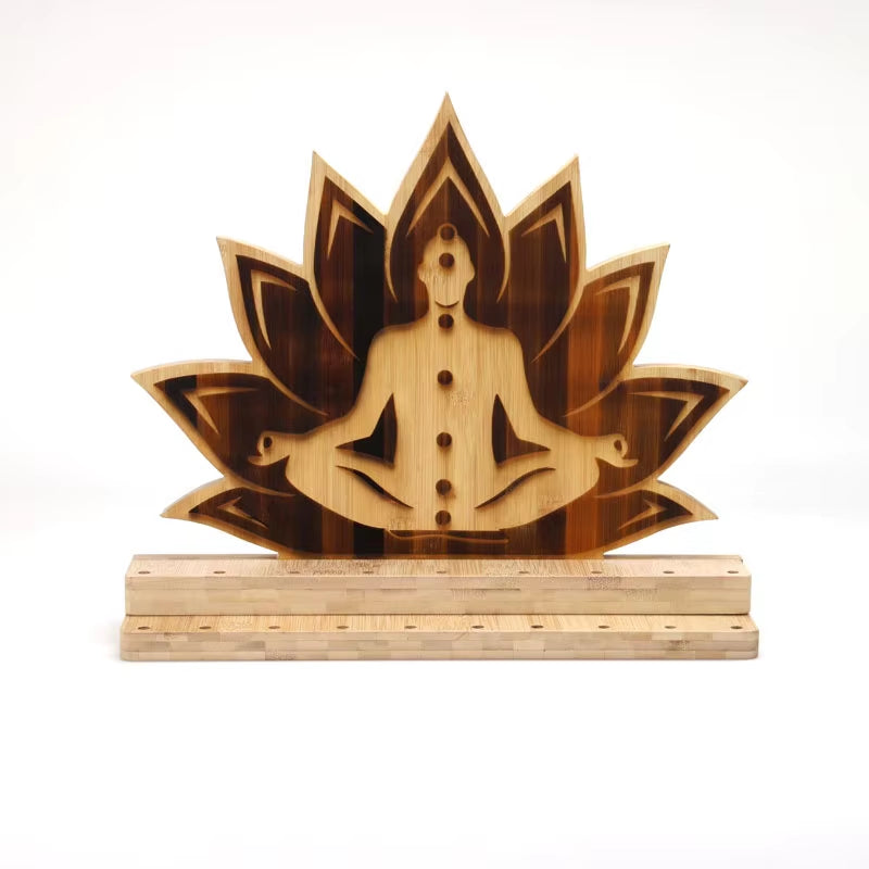 Wooden sculpture of a meditating figure in lotus design for Chakra Tuning Fork Stand