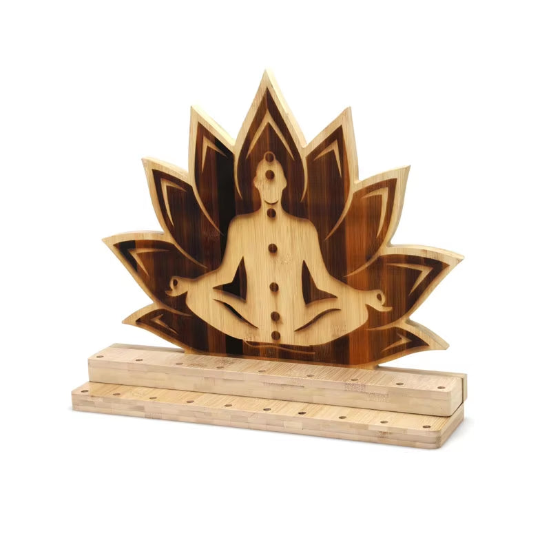 Wooden meditation figure in lotus design on Chakra Tuning Fork Stand in Bamboo