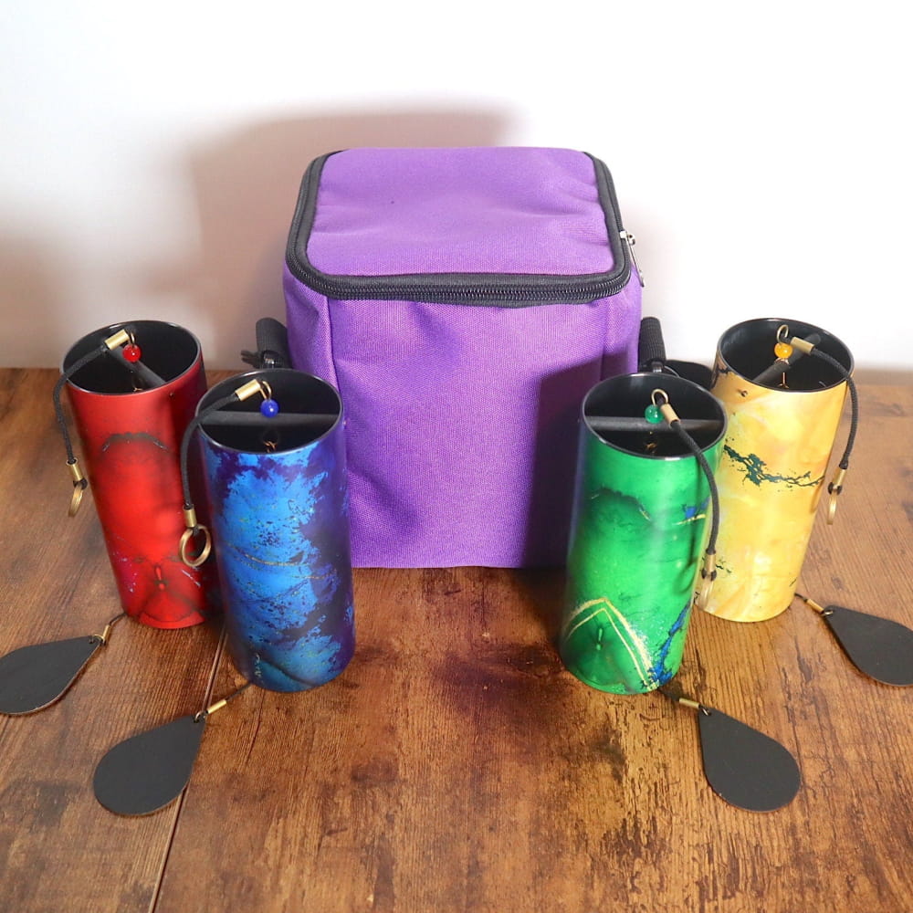 Purple insulated lunch bag with colorful drink holders around Colored Koshi Chimes Set