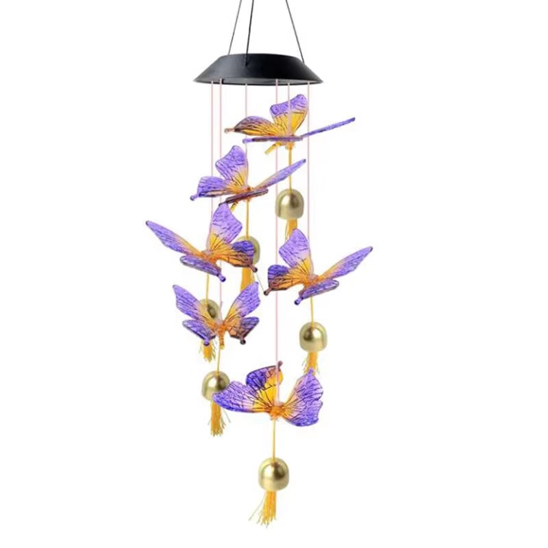Solar-powered butterfly wind chime with purple and gold accents for garden decor