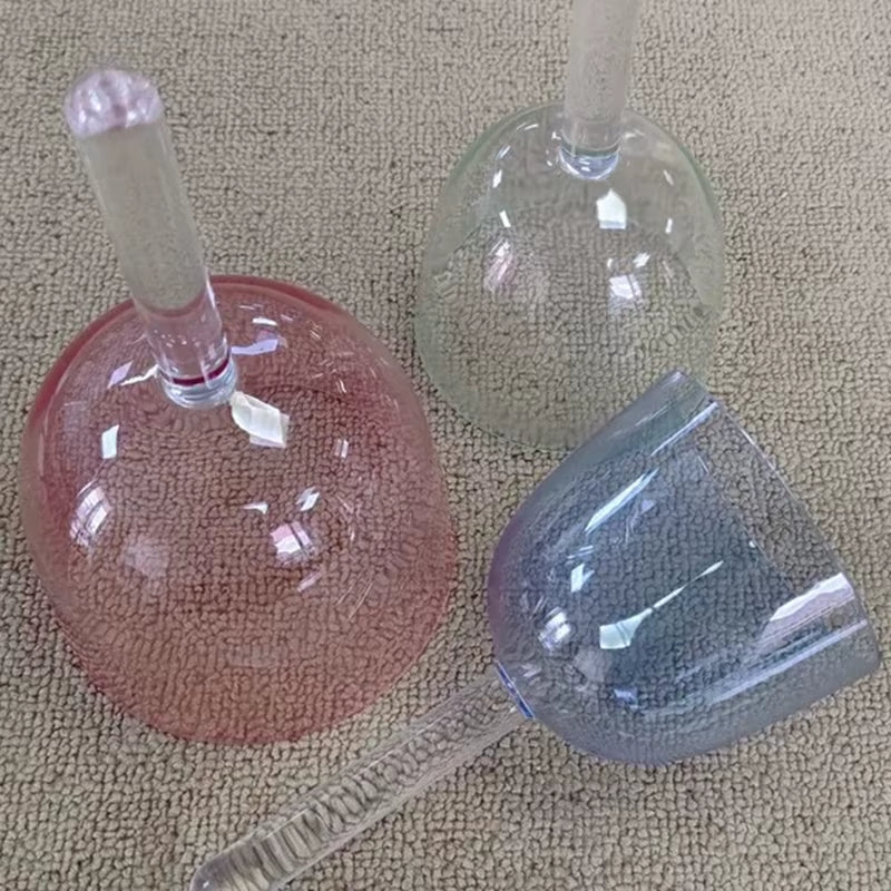 Three glass bells in pink, clear, and blue for Colorful Crystal Singing Bowl