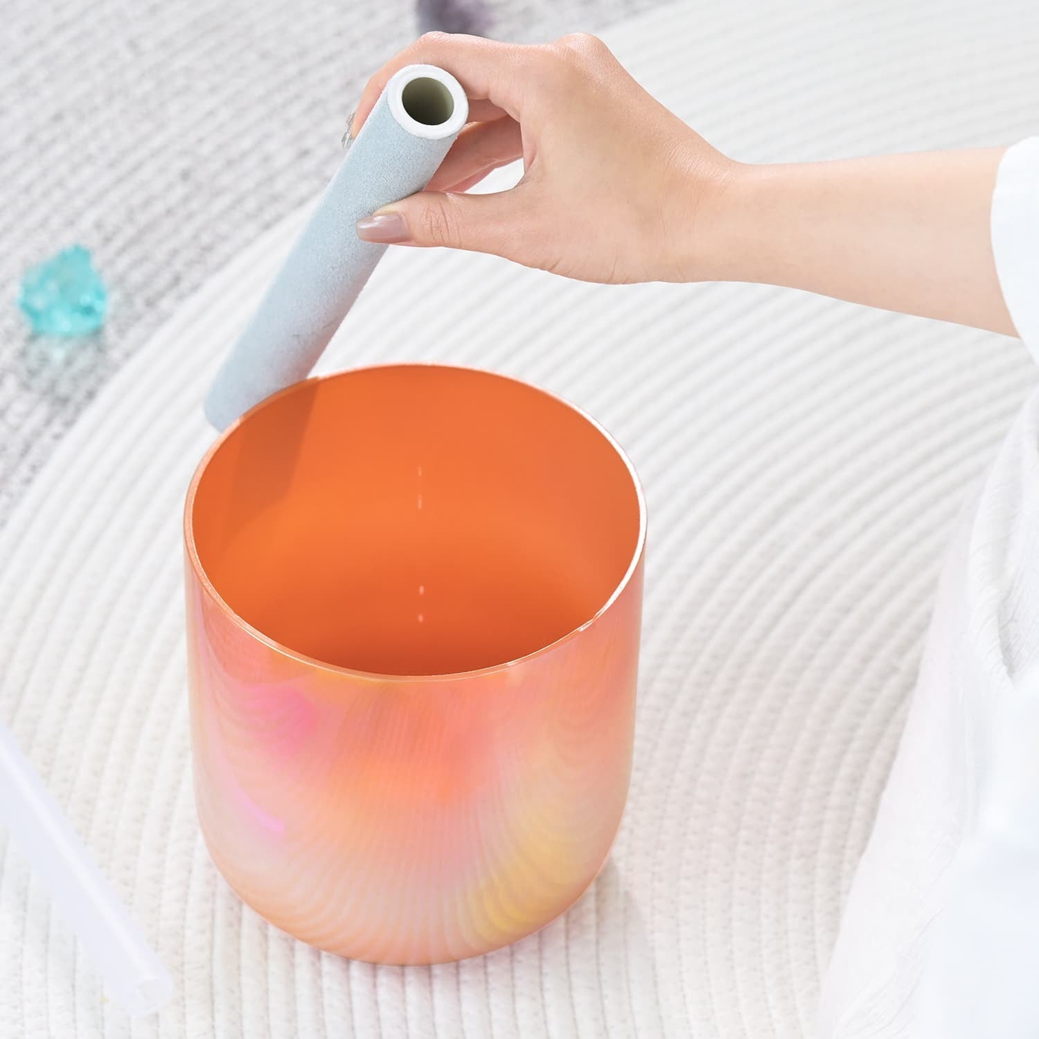 Iridescent orange and pink container with gray tube for Crystal Singing Bowl Dream Flame