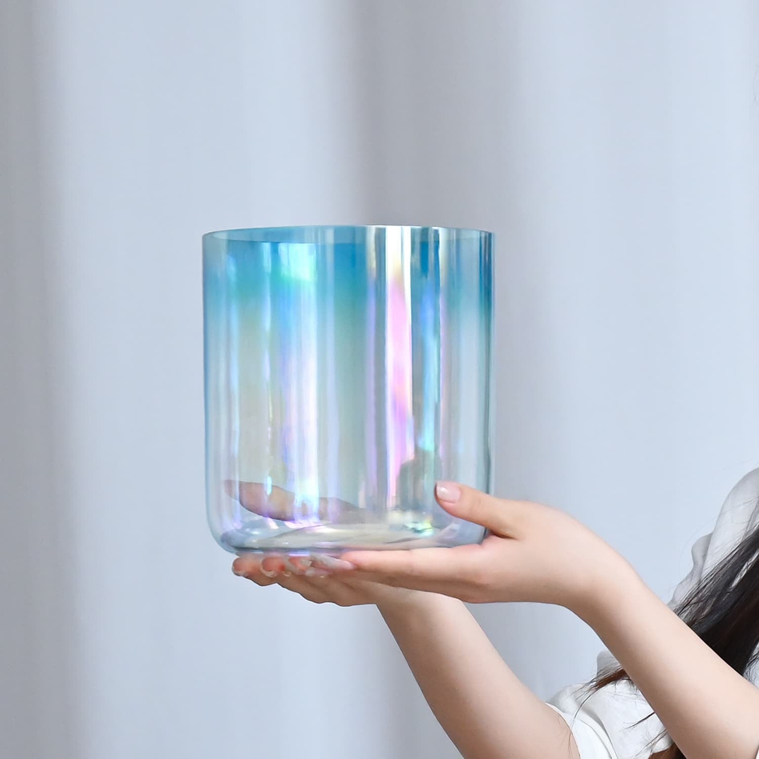 Iridescent glass cylinder with holographic rainbow effect in Crystal Singing Bowl Ice Blue