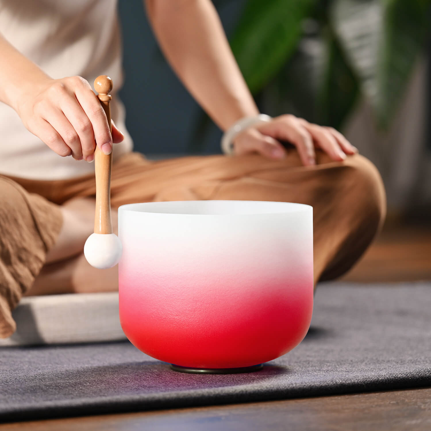 Gradient-colored Crystal Singing Bowl with mallet for Root Chakra healing meditation