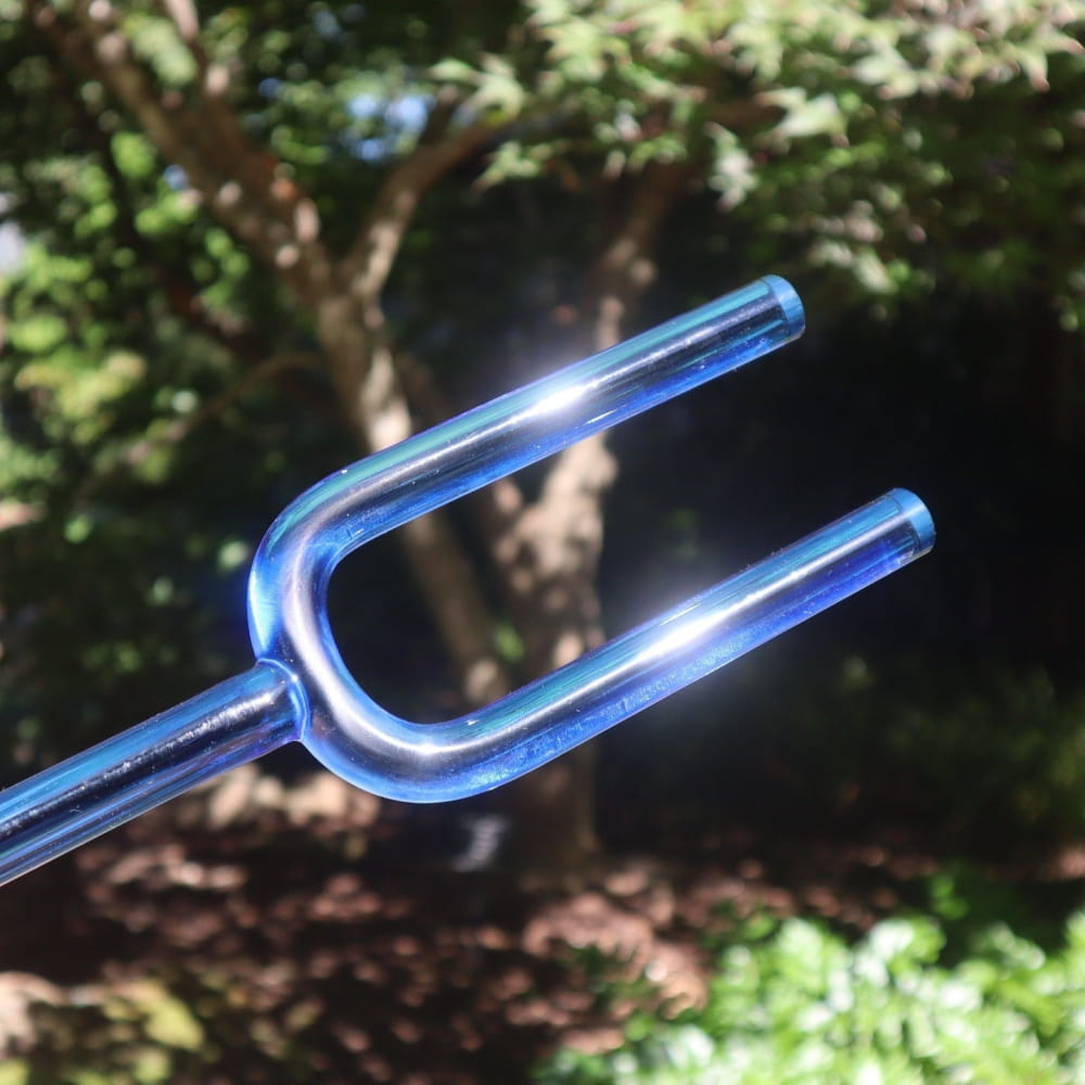 Metallic blue fork-shaped garden tool with two prongs from Crystal Tuning Fork Set