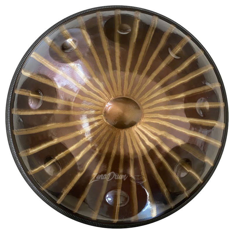 Circular metallic hubcap with sunburst pattern on D Minor Kurd Handpan Drum for sale