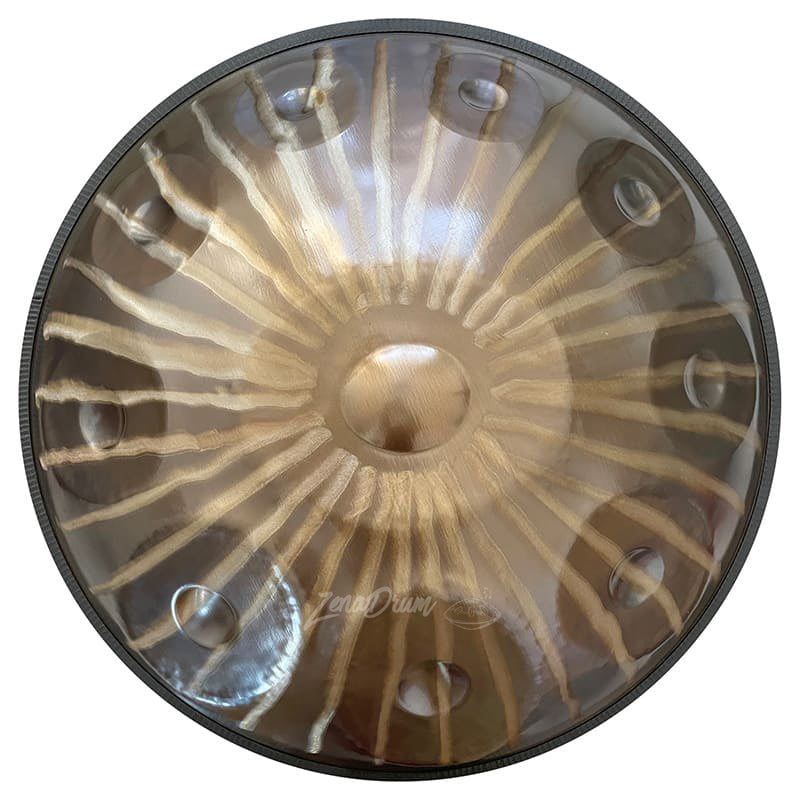 Metallic circular disc with sunburst pattern for D Minor Kurd Handpan Drum