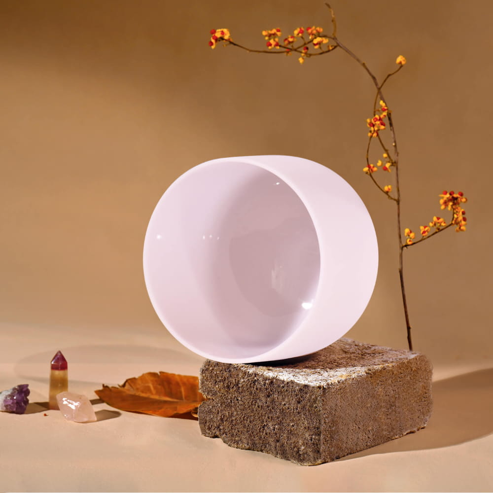 White ceramic vessel with open circular shape for D Note Pink Rose Quartz Singing Bowl