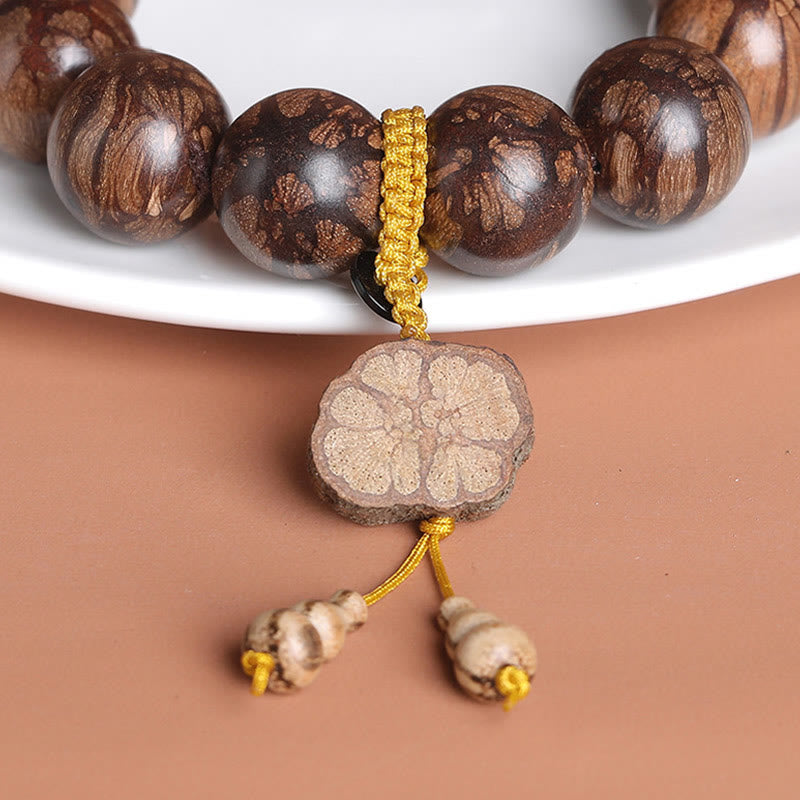 15mm Plum Blossom Wood Inner Peace Bracelet