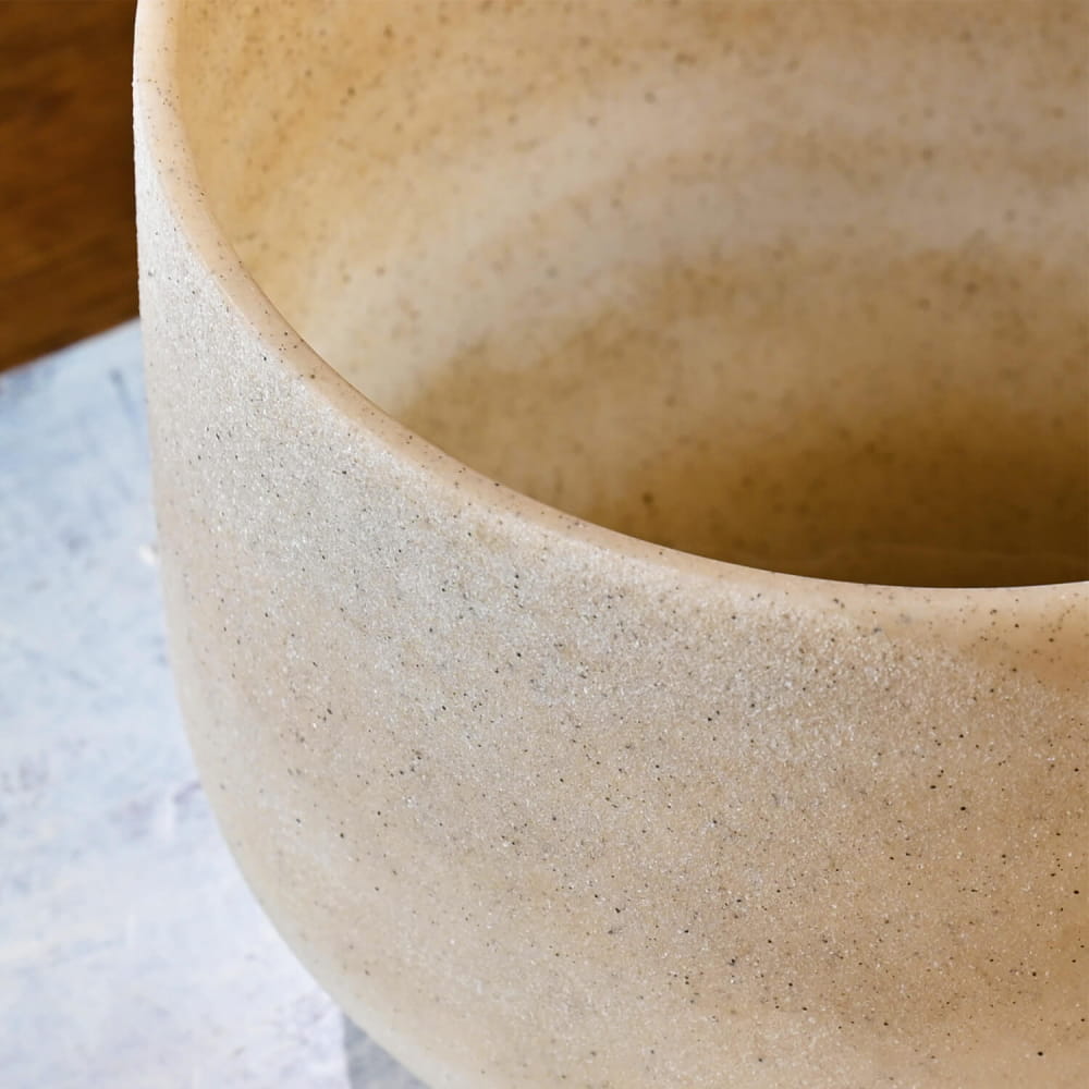 Beige ceramic cup with speckled texture for E Note Tea Topaz Gemstone Fusion Bowl