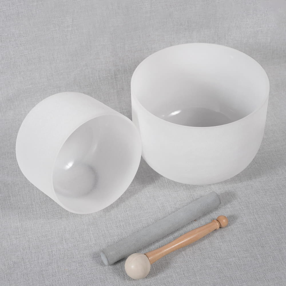 Frosted white crystal singing bowls with mallet in Earth Star & Soul Star set