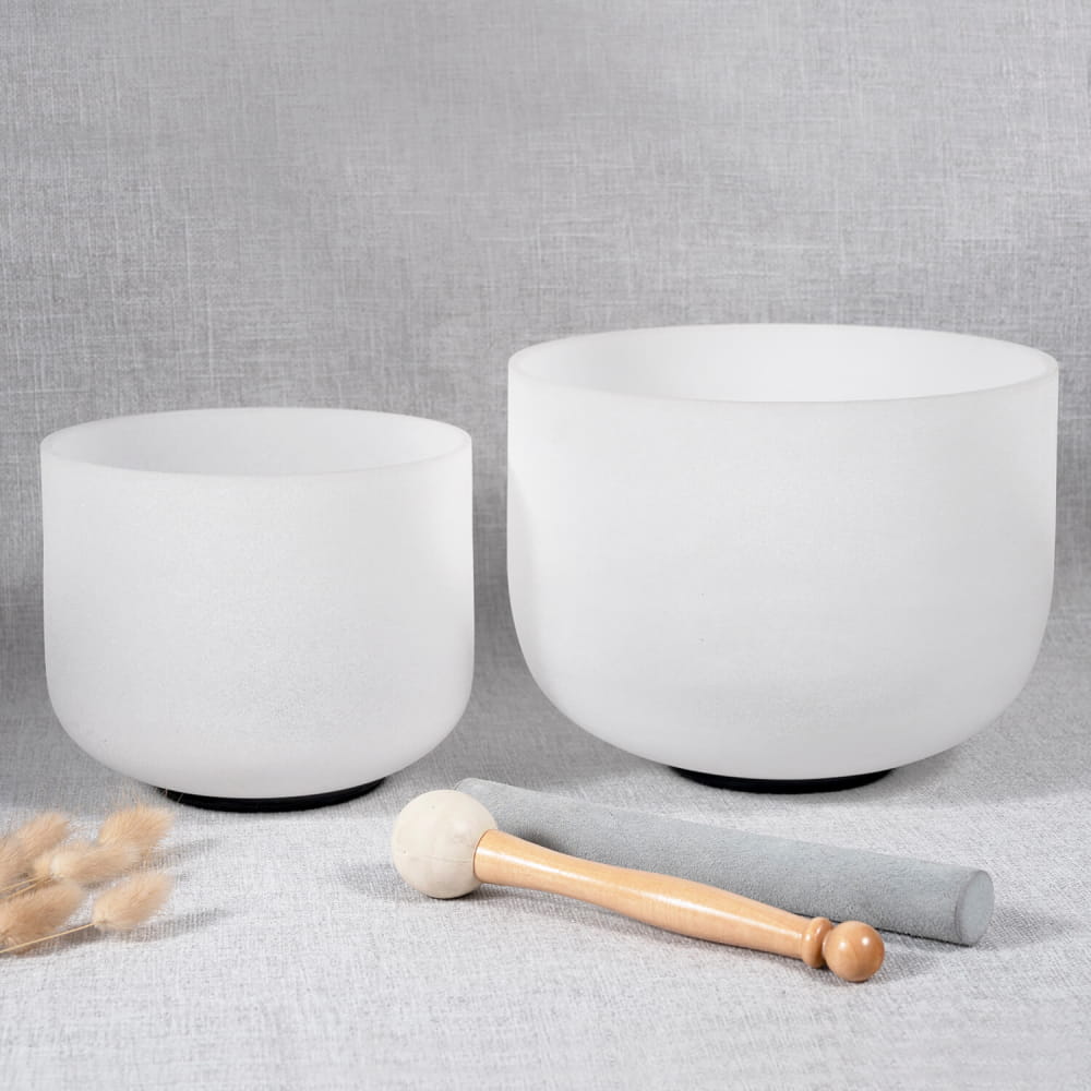 White crystal singing bowls with wooden mallets from Earth Star and Soul Star set