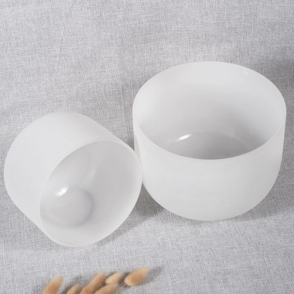 Two white frosted crystal singing bowls with carrier bag for Earth Star and Soul Star