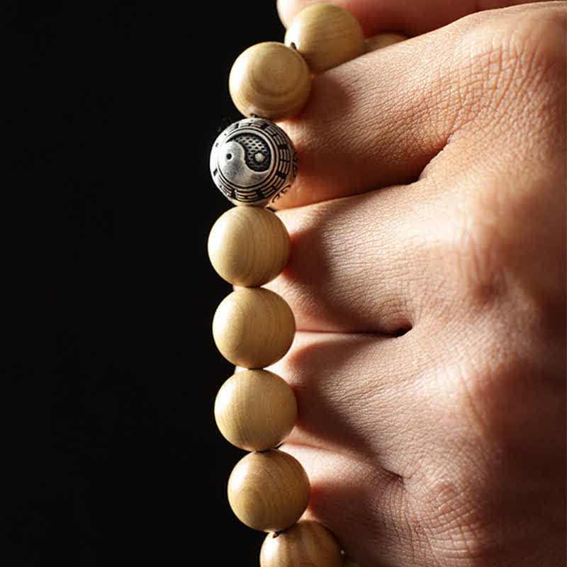 Cinnabar Bracelet with Peach Wood and Lotus Symbols