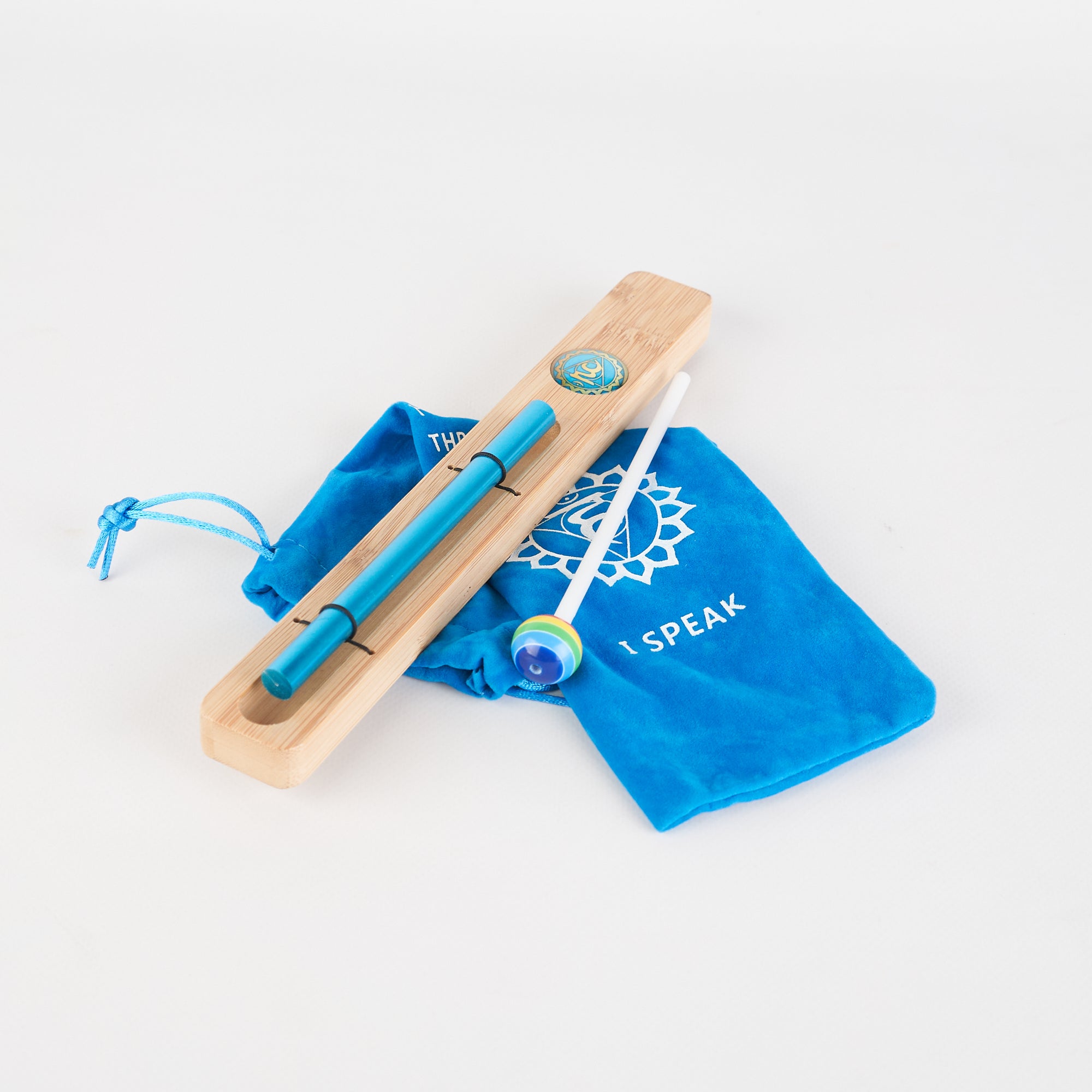 Wooden kazoo with blue accents and matching drawstring bag for Energy Bar Chimes