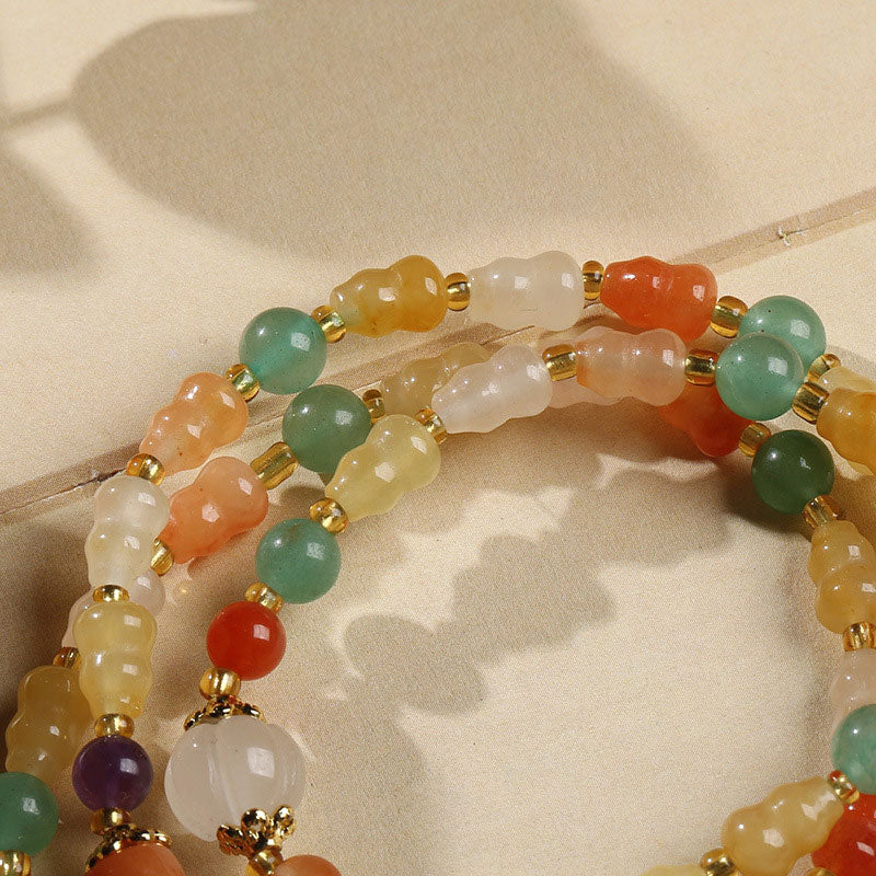 Golden Silk Jade Gourd Wealth Bracelet 10mm Unisex