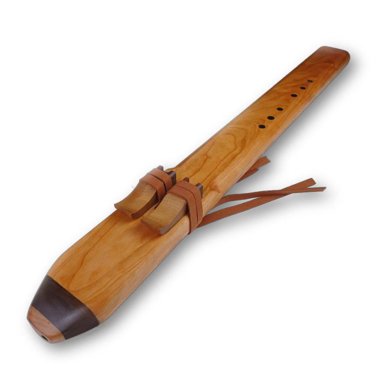 Handmade Wooden Native American-style flute with leather straps and dark mouthpiece