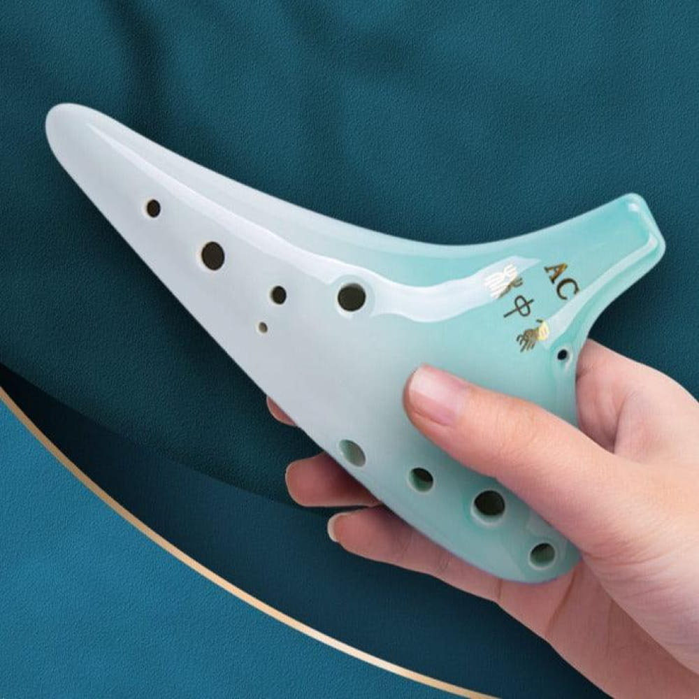 Mint green and white plastic ocarina with finger holes for Gradient 12 Hole Tenor Alto Flute